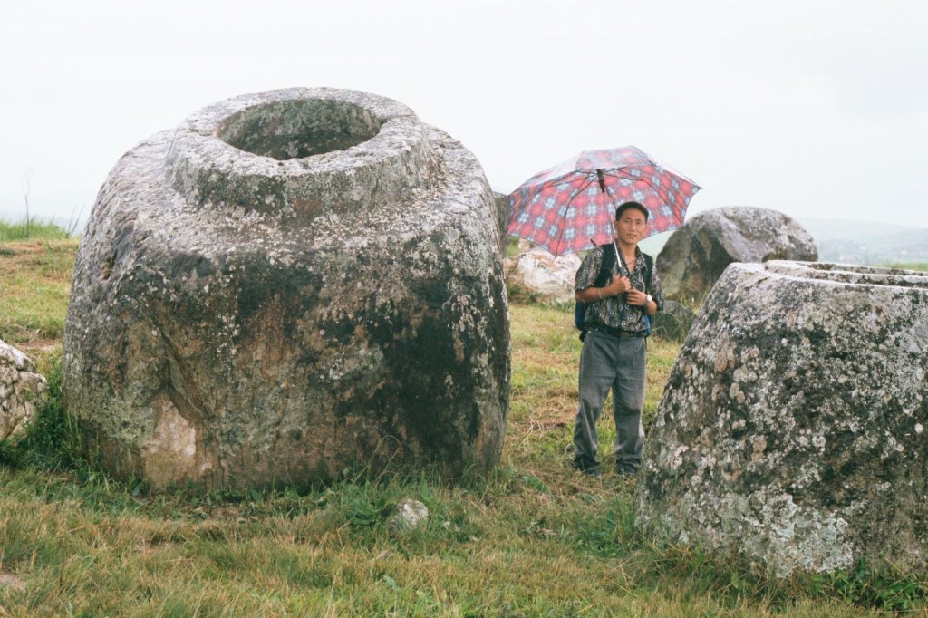 The Plain of Jars in Laos — ancient stone vessels in a landscape still scarred by unexploded ordnance from the Vietnam War.