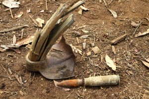 Given the known details of the accident it is likely that the girl hit a 20mm shell with her hoe.  Her hoe is shown here with one of several 20mm rounds found in the garden.